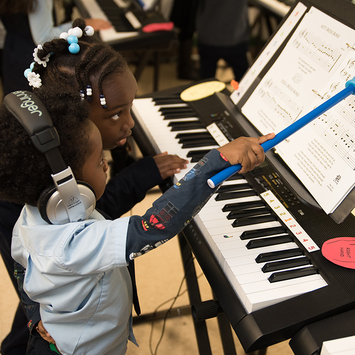 Children Playing Piano